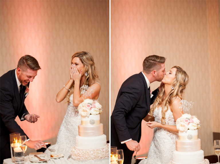 Bride & groom cake cutting kiss