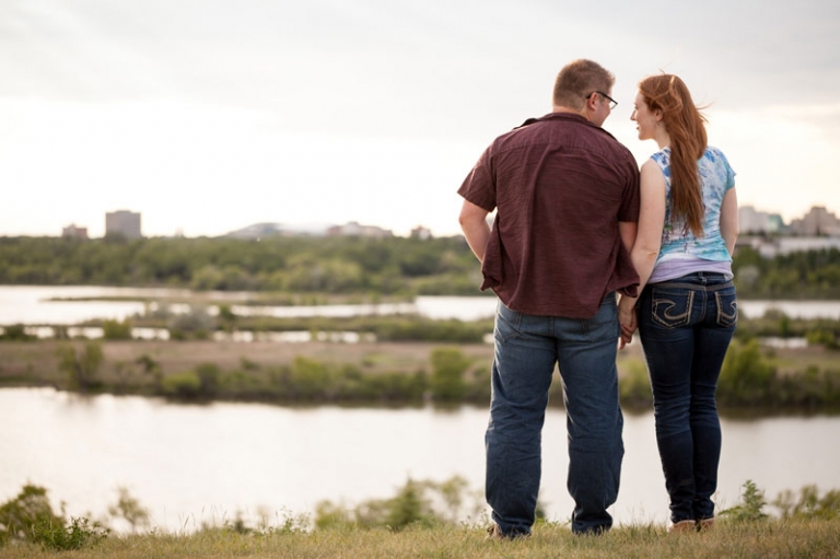 Engagement photos at sunset overlooking wascana lake