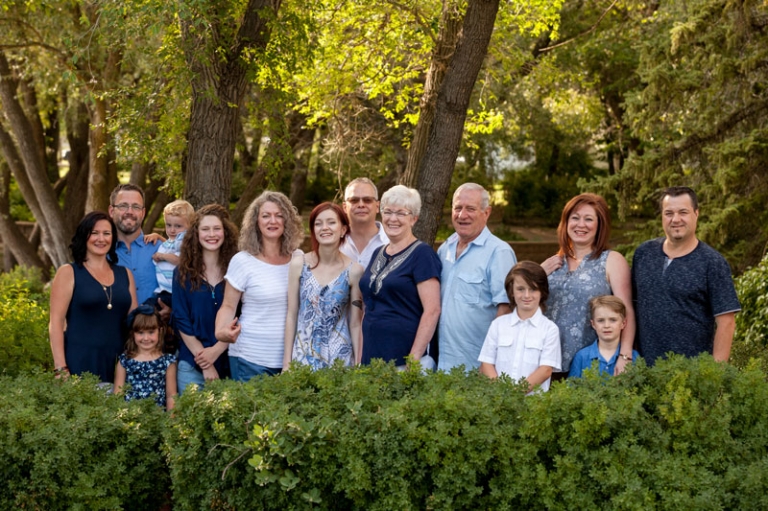 Family Photo in park with bushes