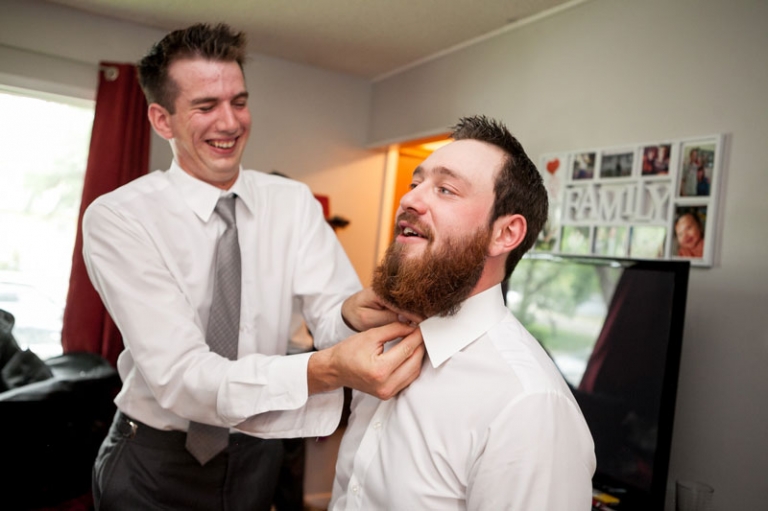 Buttoning up shirt Groomsmen