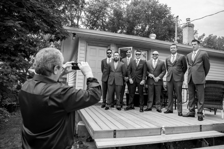Groomsmen leaving house wedding morning
