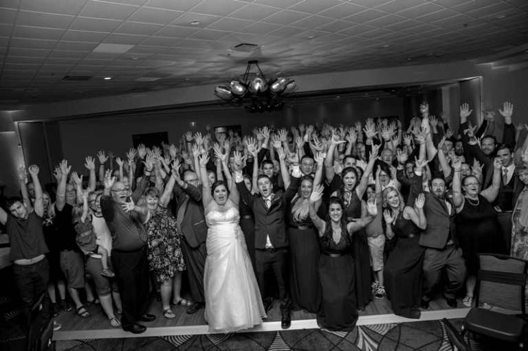 Wedding reception group photo at Double Tree Hilton with King's Court Music in Regina