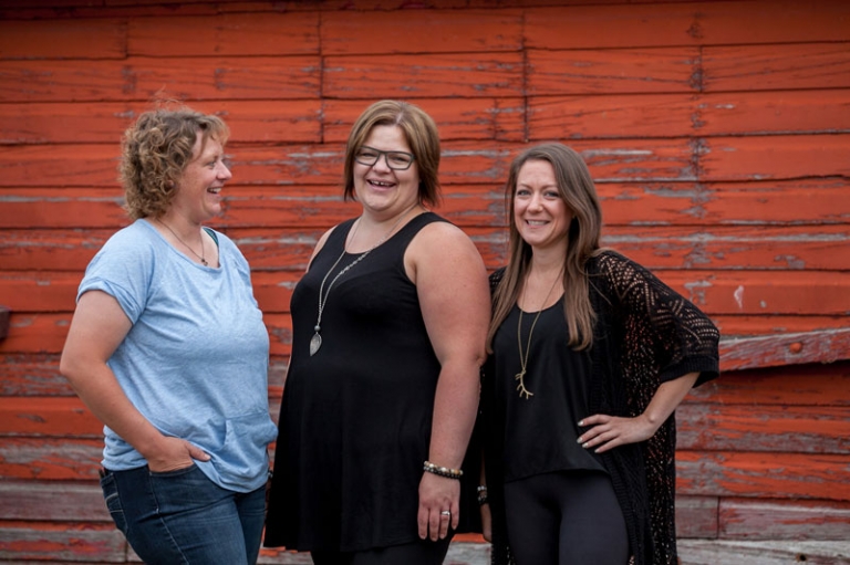 Sisters with red barn