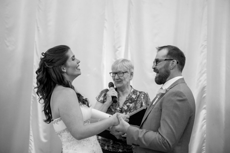 Bride laughing during ceremony