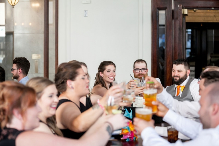 wedding party pub toast photo