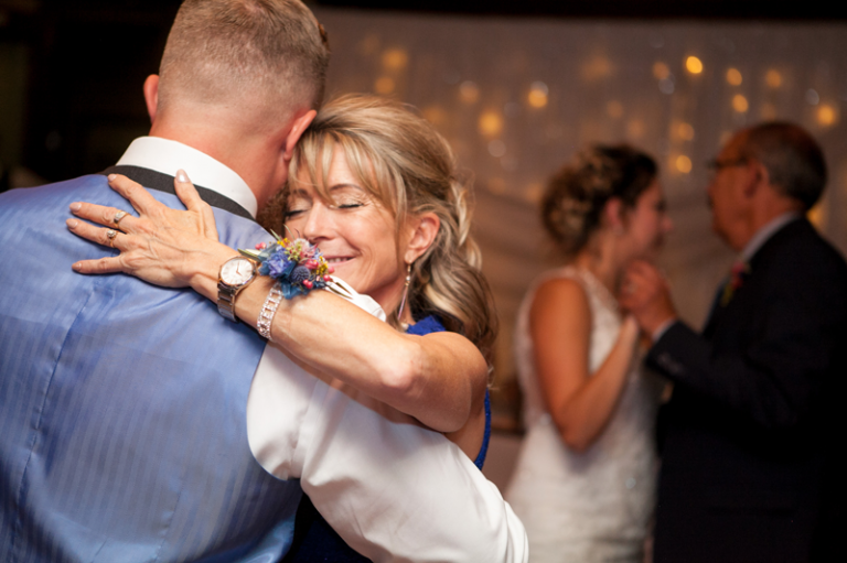 Mother and groom dance