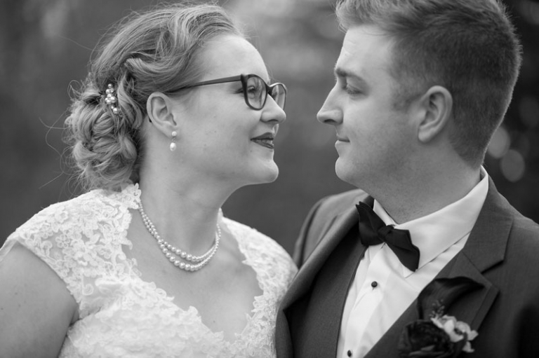 Bride and Groom close up portrait black and white by Collin Stumpf