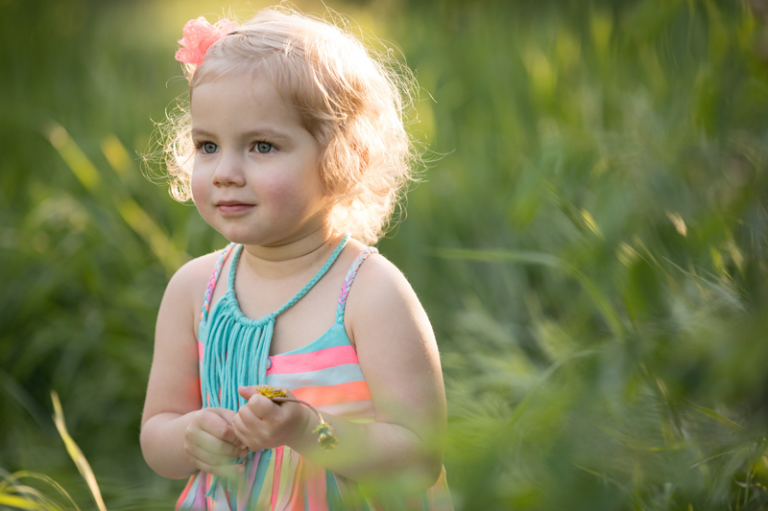 photograph of little girl at golden hour