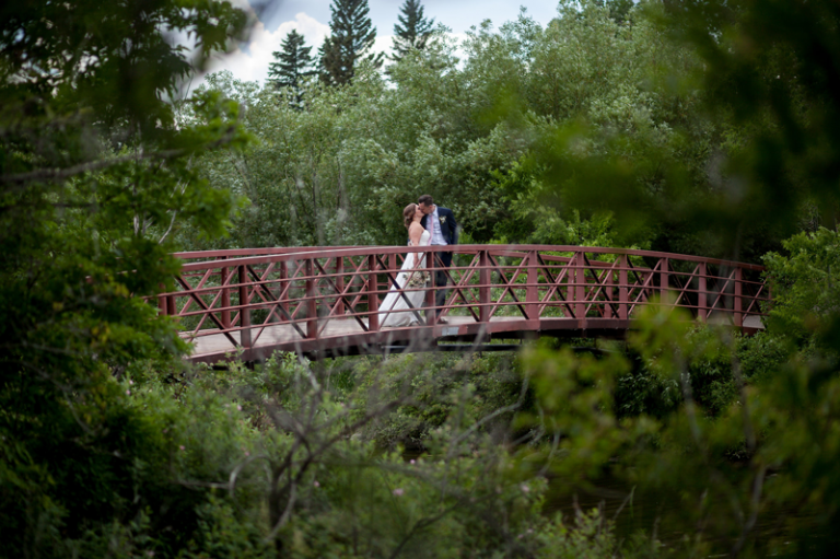 Bride and Groom on a bridge