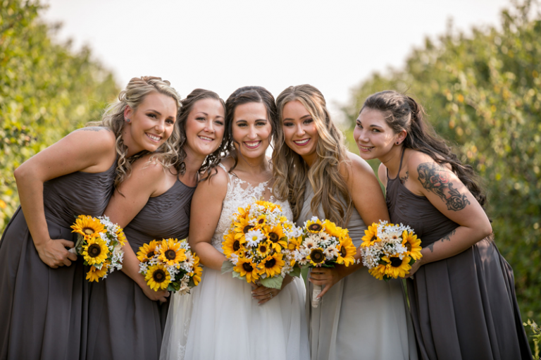 bridemaids with sunflowers