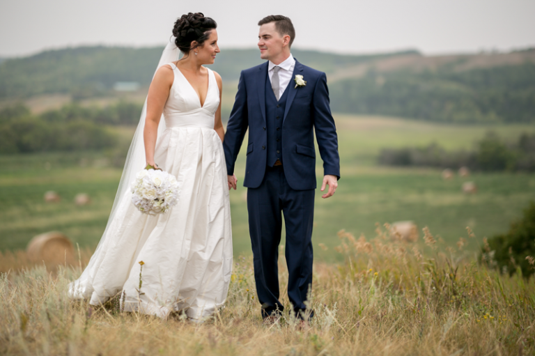 bride and groom walking portrait