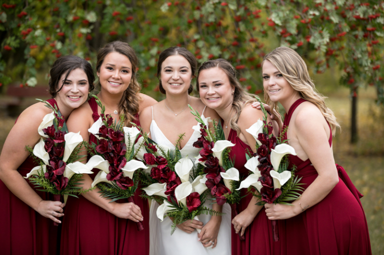 bride and bridesmaids with bouquets